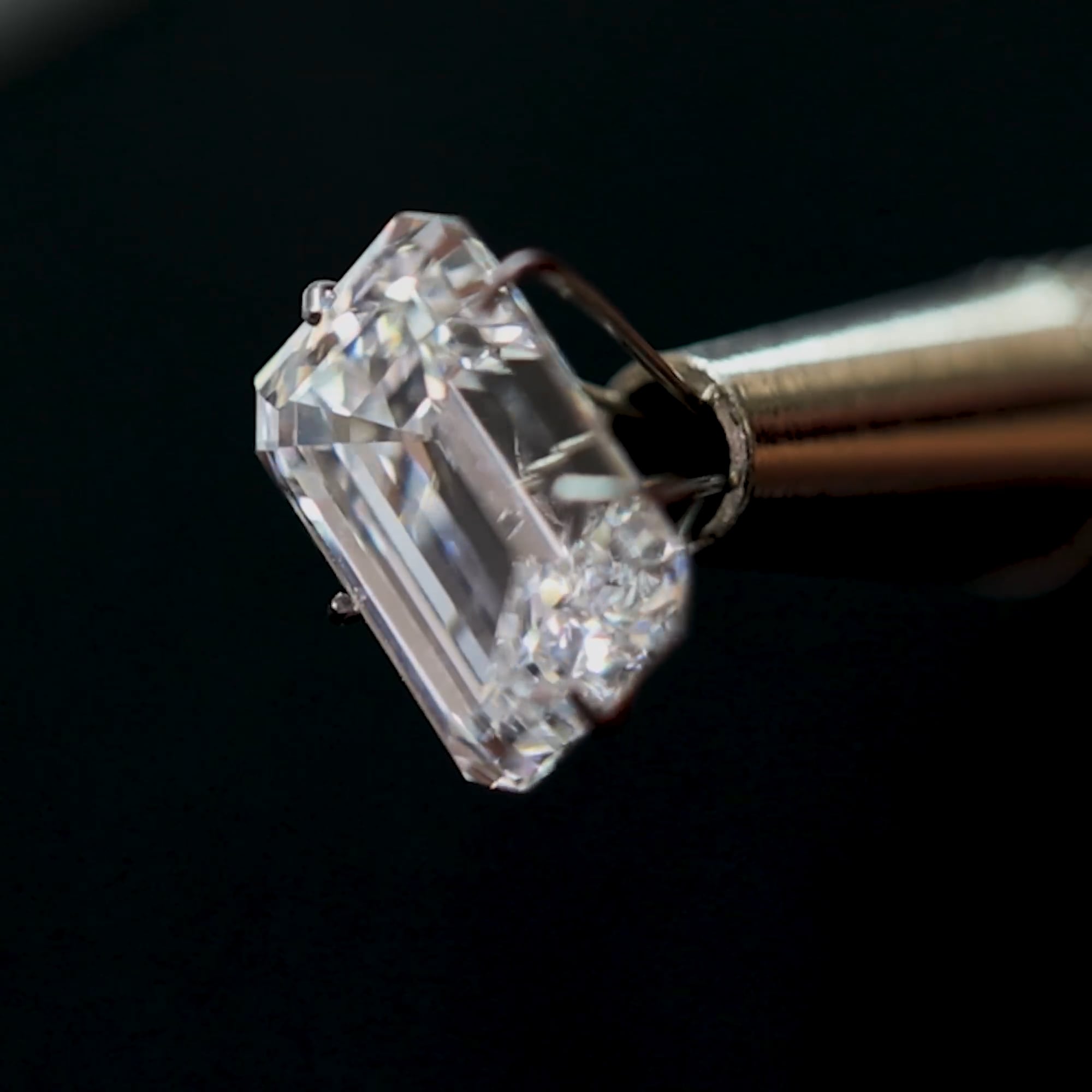 Emerald Cut Three-Stone Engagement Ring