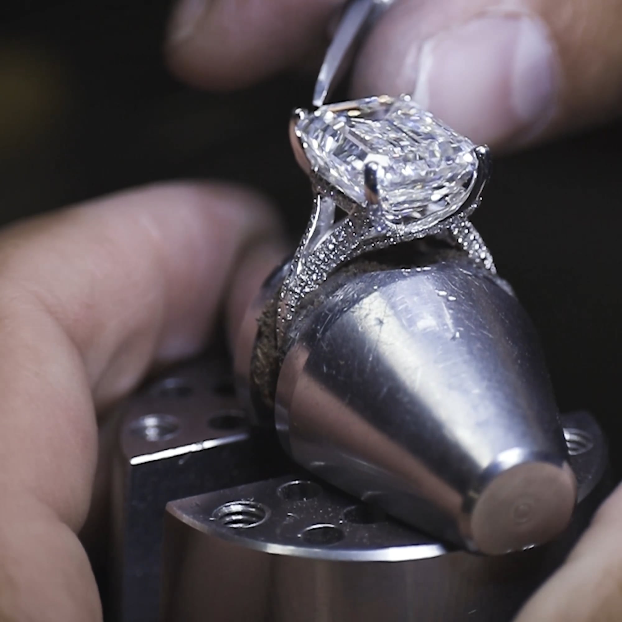 Emerald Cut Three-Stone Ring with Trapezoid Step-Cut Side Stones