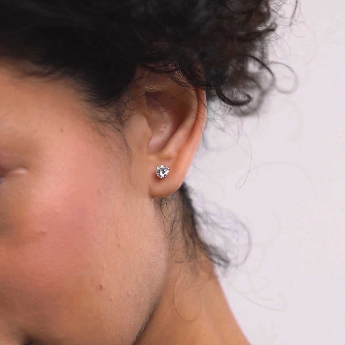 Modern Radiance Three-Prong Diamond Stud Earrings