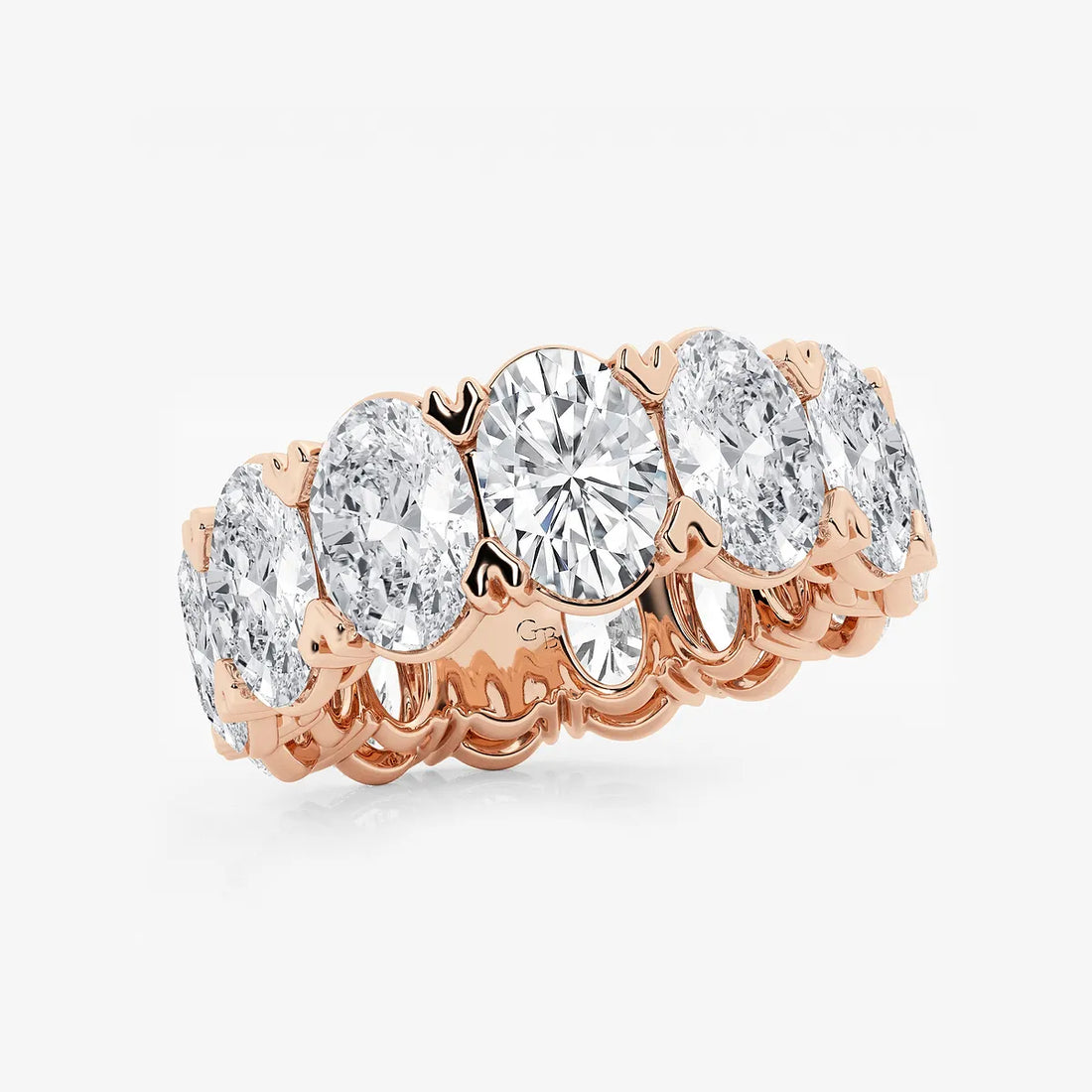 Sleek Oval Lab Grown Diamond V Prong Eternity Band in Solid Gold