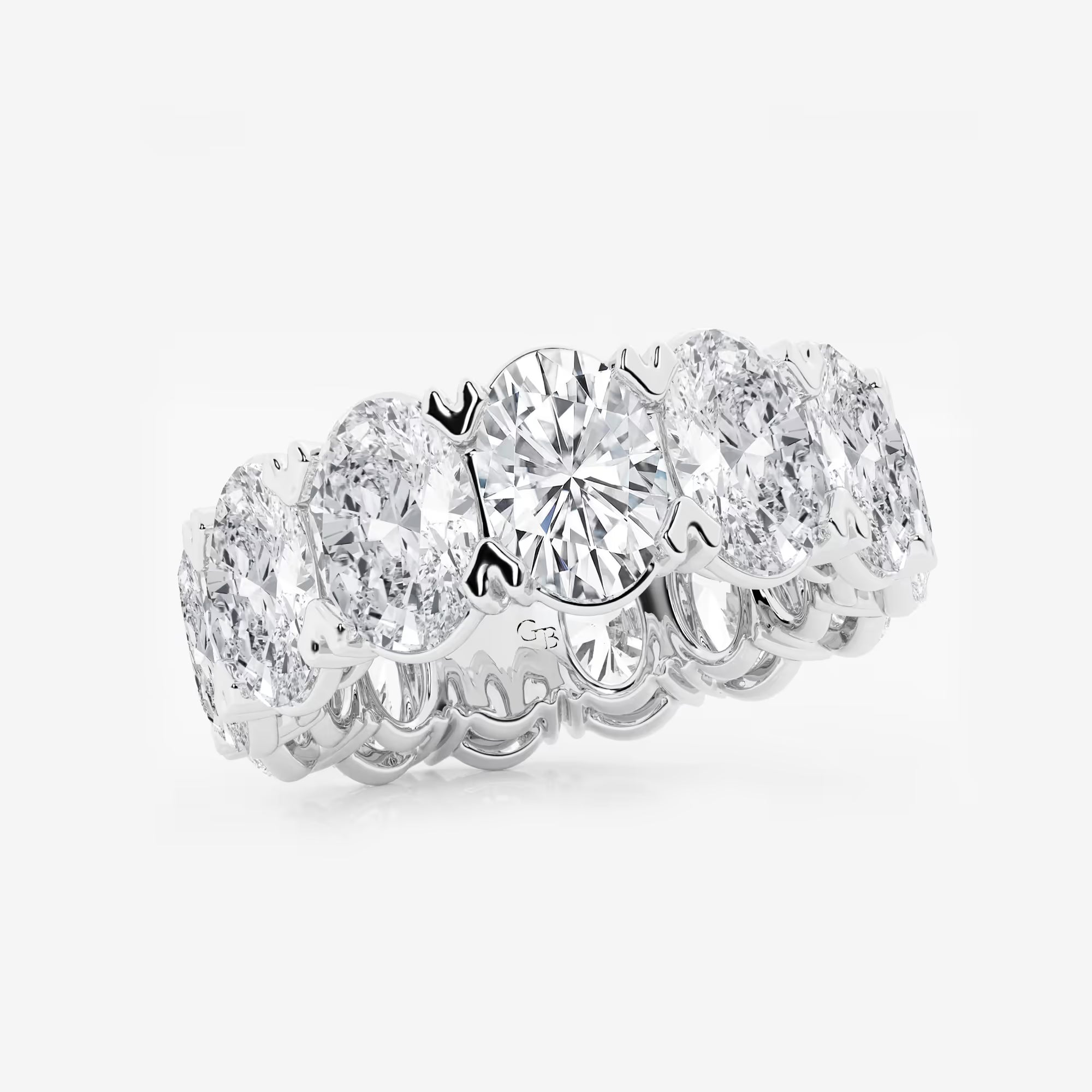 Sleek Oval Lab Grown Diamond V Prong Eternity Band in Solid Gold