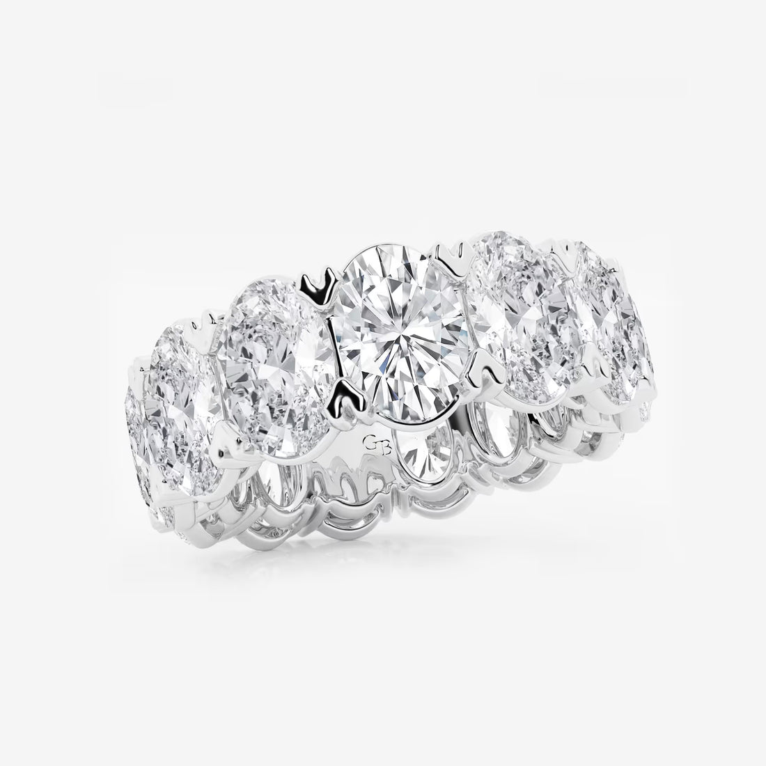 Sleek Oval Lab Grown Diamond V Prong Eternity Band in Solid Gold