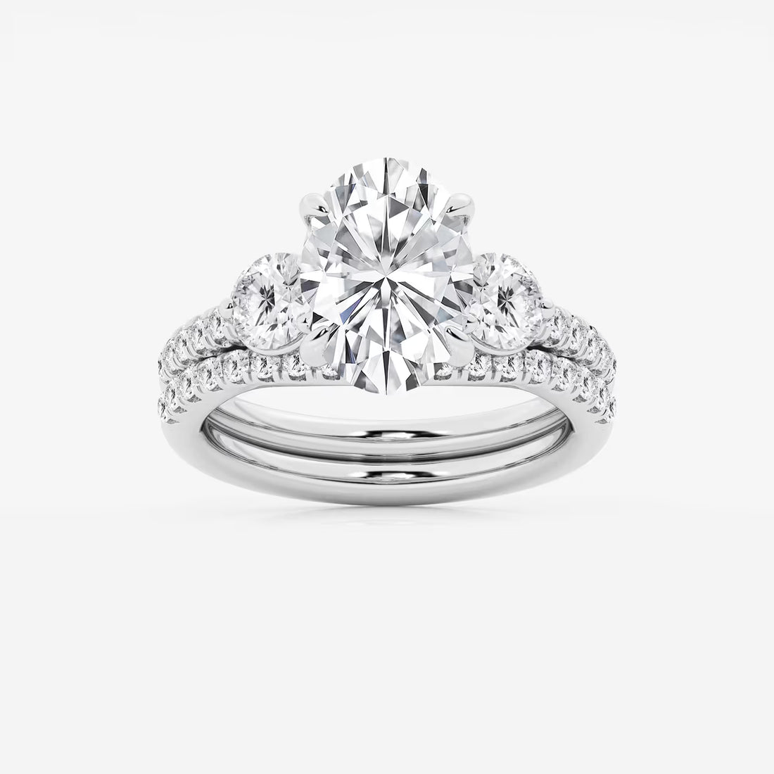 Oval Three Stone Lab-Grown Diamond Bridal Ring Set with Pavé Bands