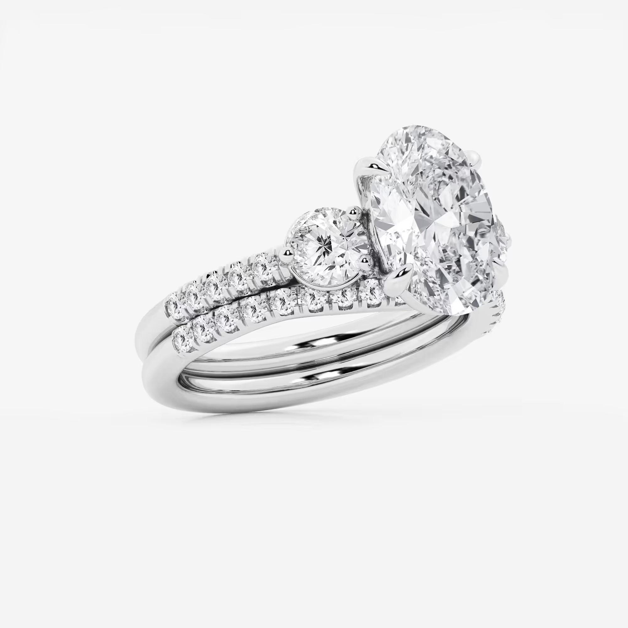 Oval Three Stone Lab-Grown Diamond Bridal Ring Set with Pavé Bands