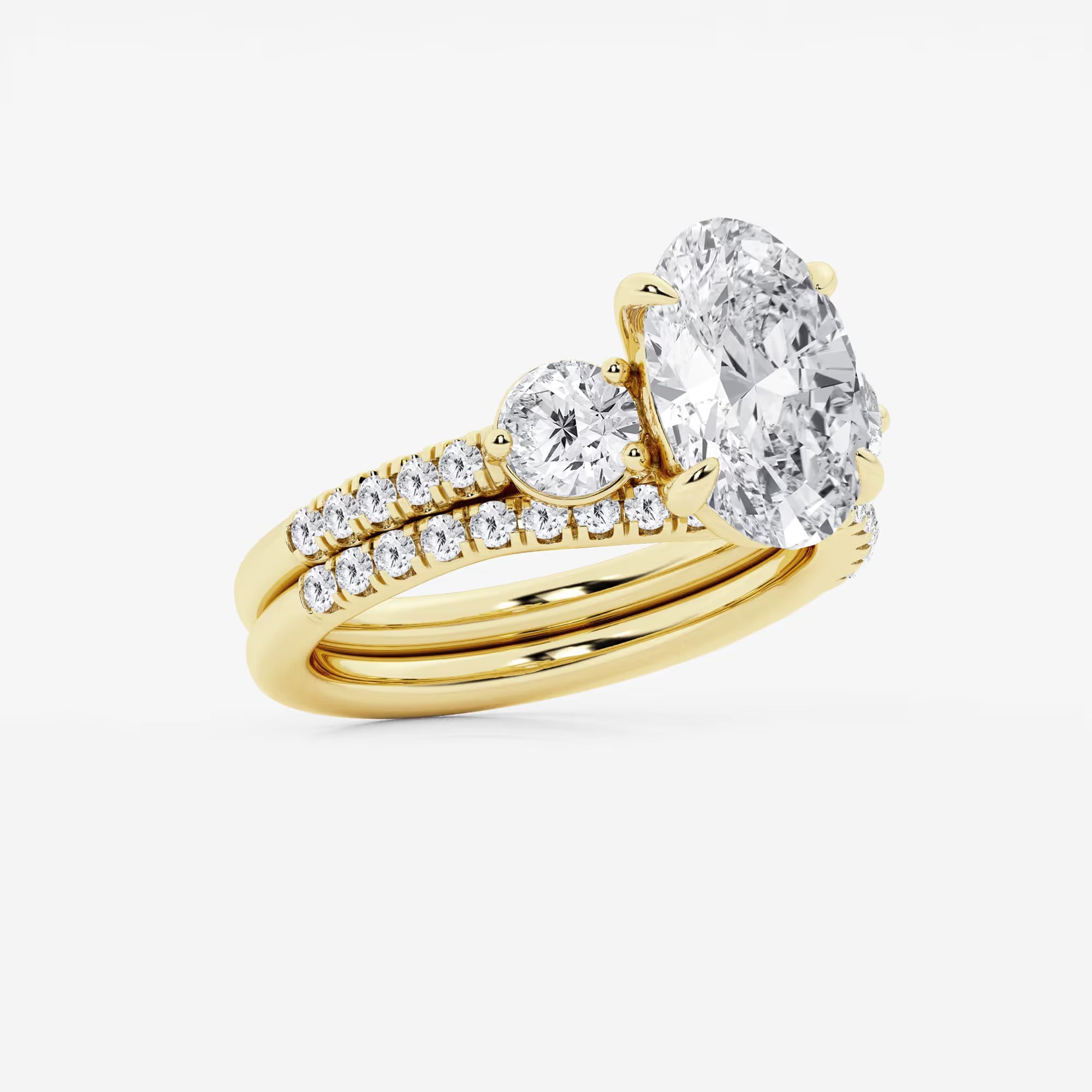 Oval Three Stone Lab-Grown Diamond Bridal Ring Set with Pavé Bands