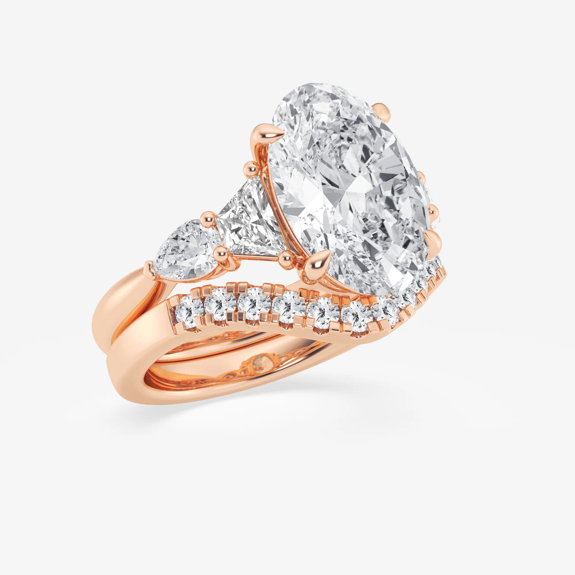 Oval Cut Three-Stone Bridal Ring Set