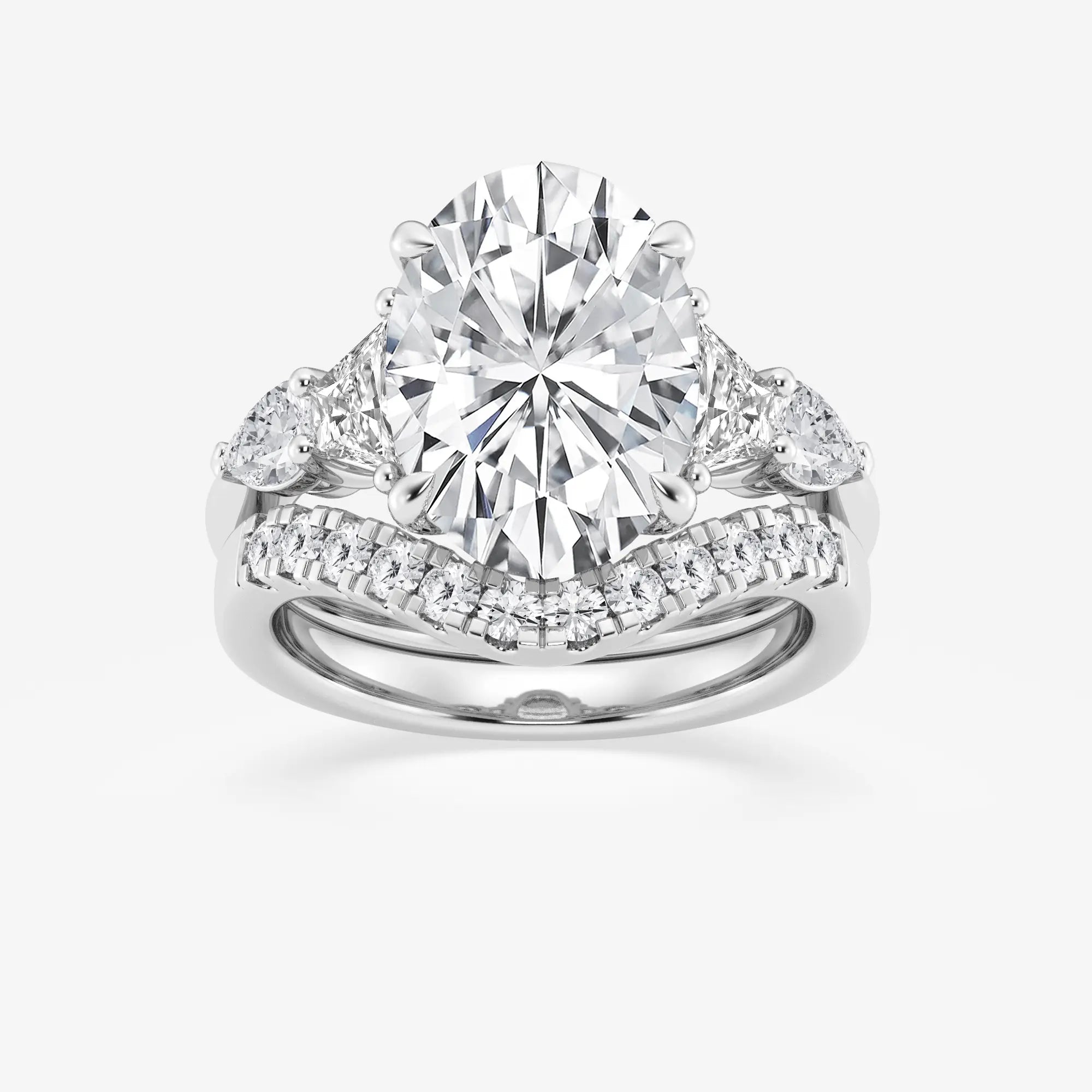 Oval Cut Three-Stone Bridal Ring Set