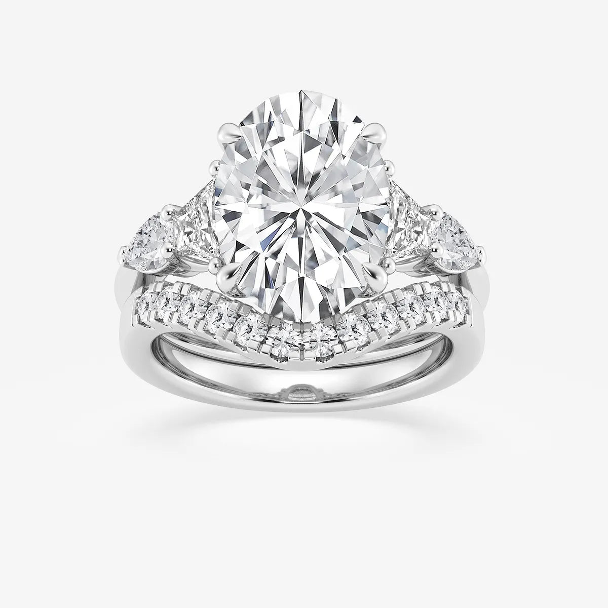 Oval Cut Three-Stone Bridal Ring Set