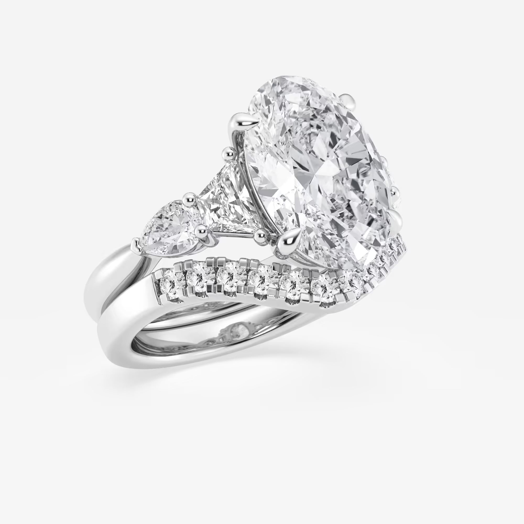 Oval Cut Three-Stone Bridal Ring Set