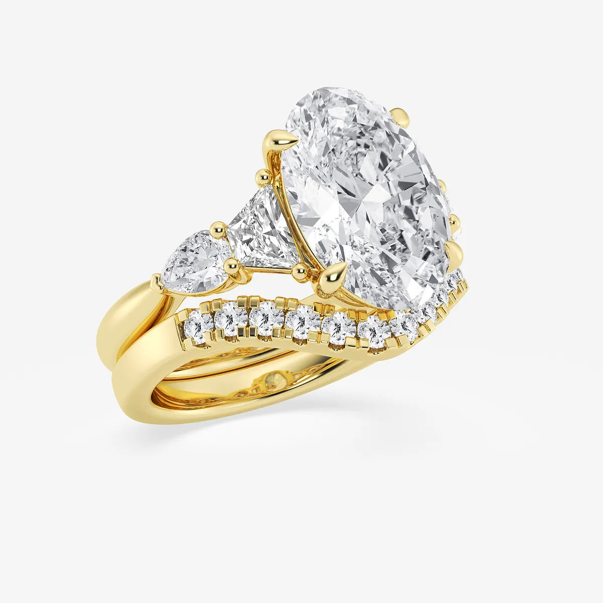 Oval Cut Three-Stone Bridal Ring Set