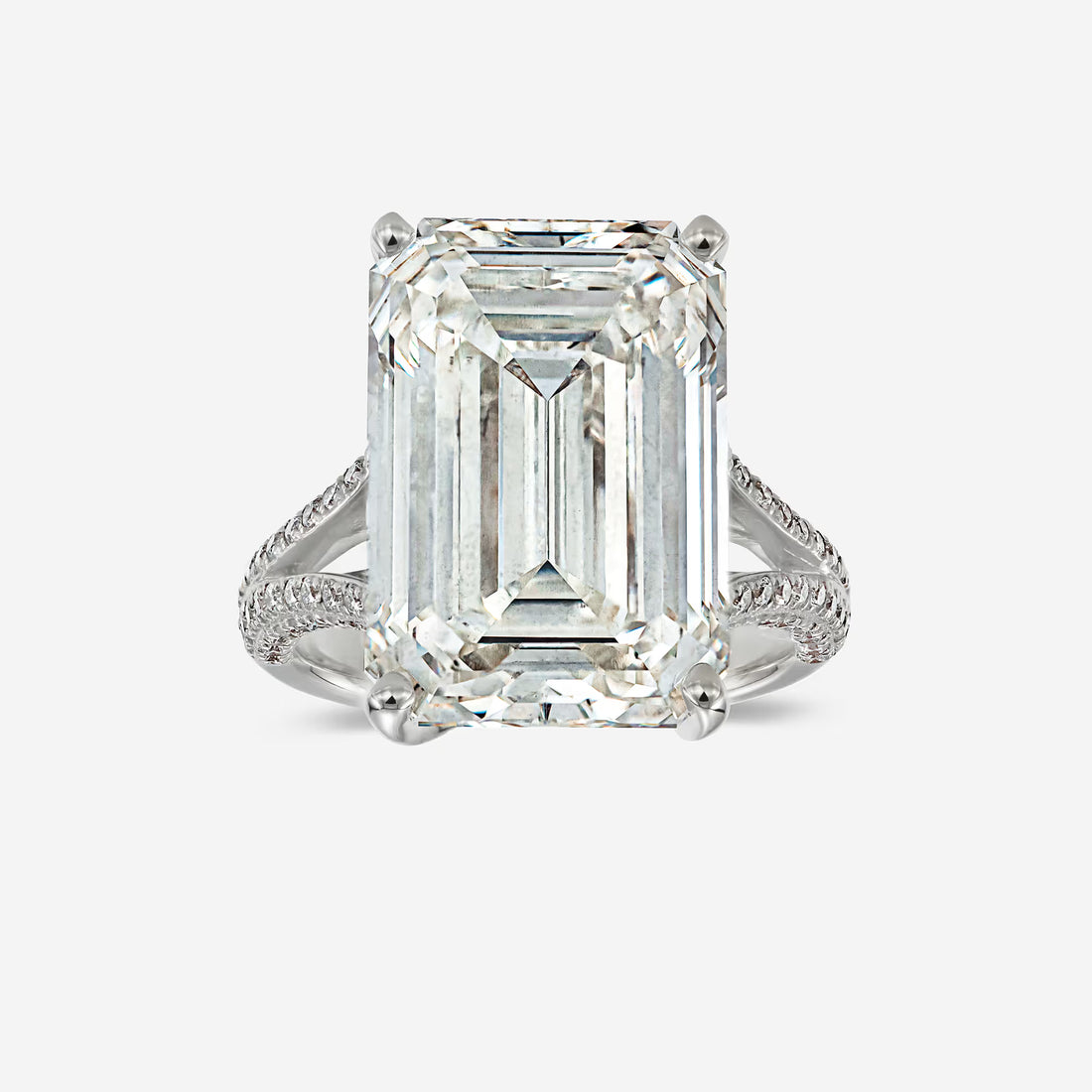 Emerald Cut Three-Stone Ring with Trapezoid Step-Cut Side Stones