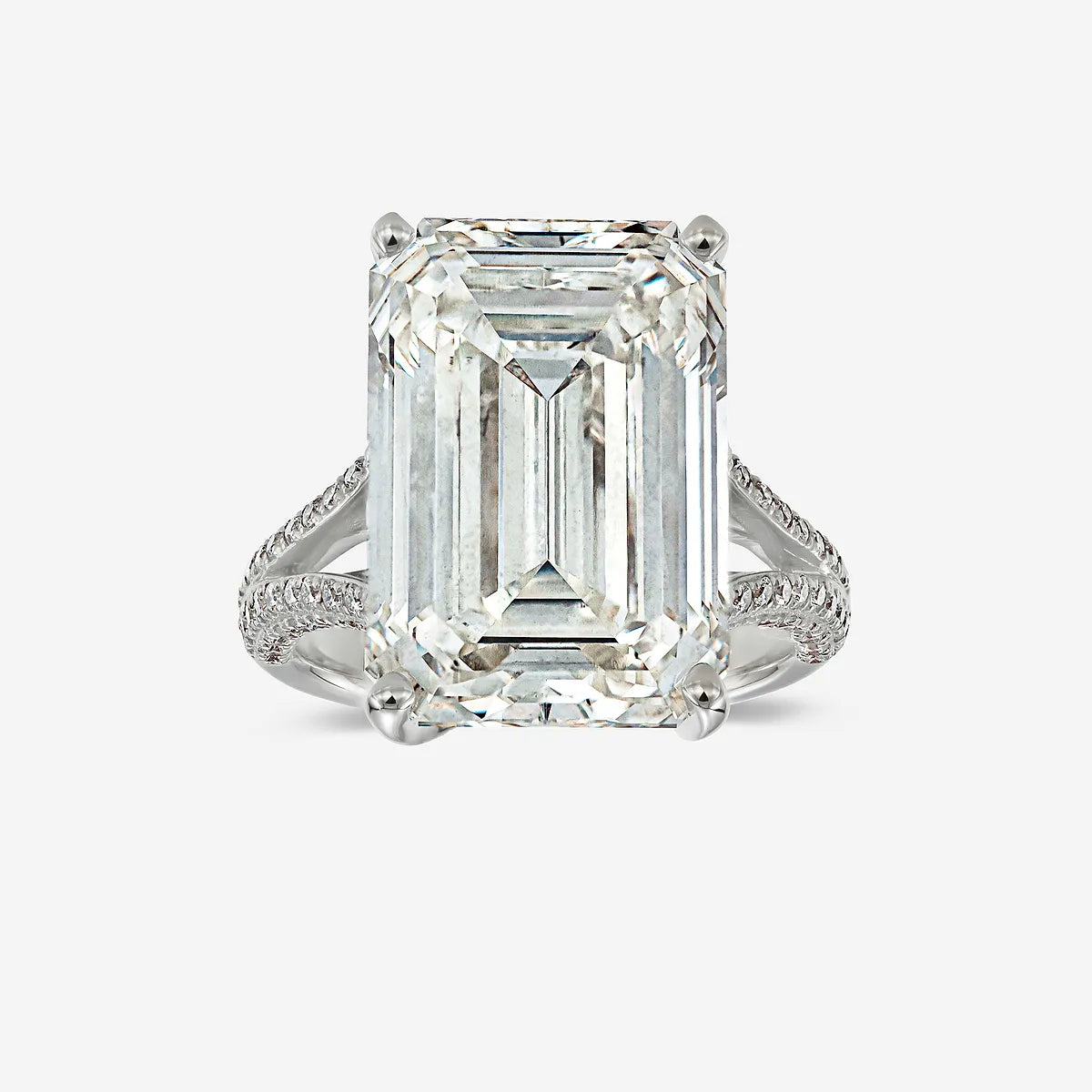 Emerald Cut Three-Stone Ring with Trapezoid Step-Cut Side Stones