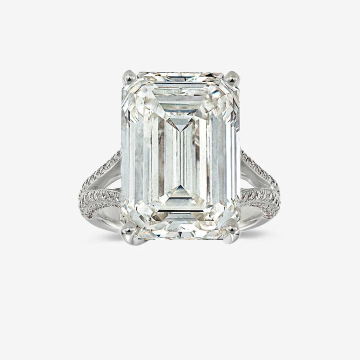 Emerald Cut Three-Stone Ring with Trapezoid Step-Cut Side Stones