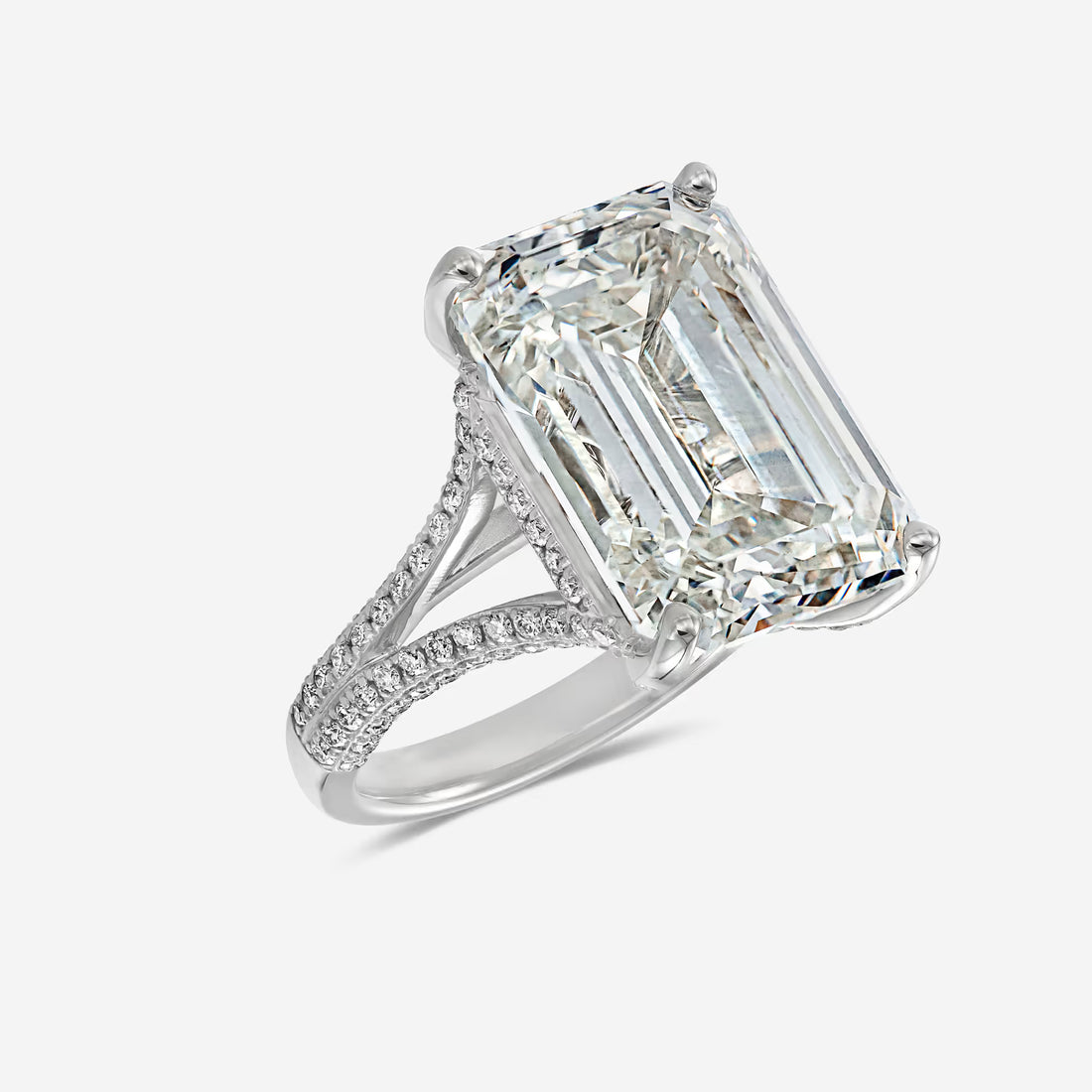 Emerald Cut Three-Stone Ring with Trapezoid Step-Cut Side Stones