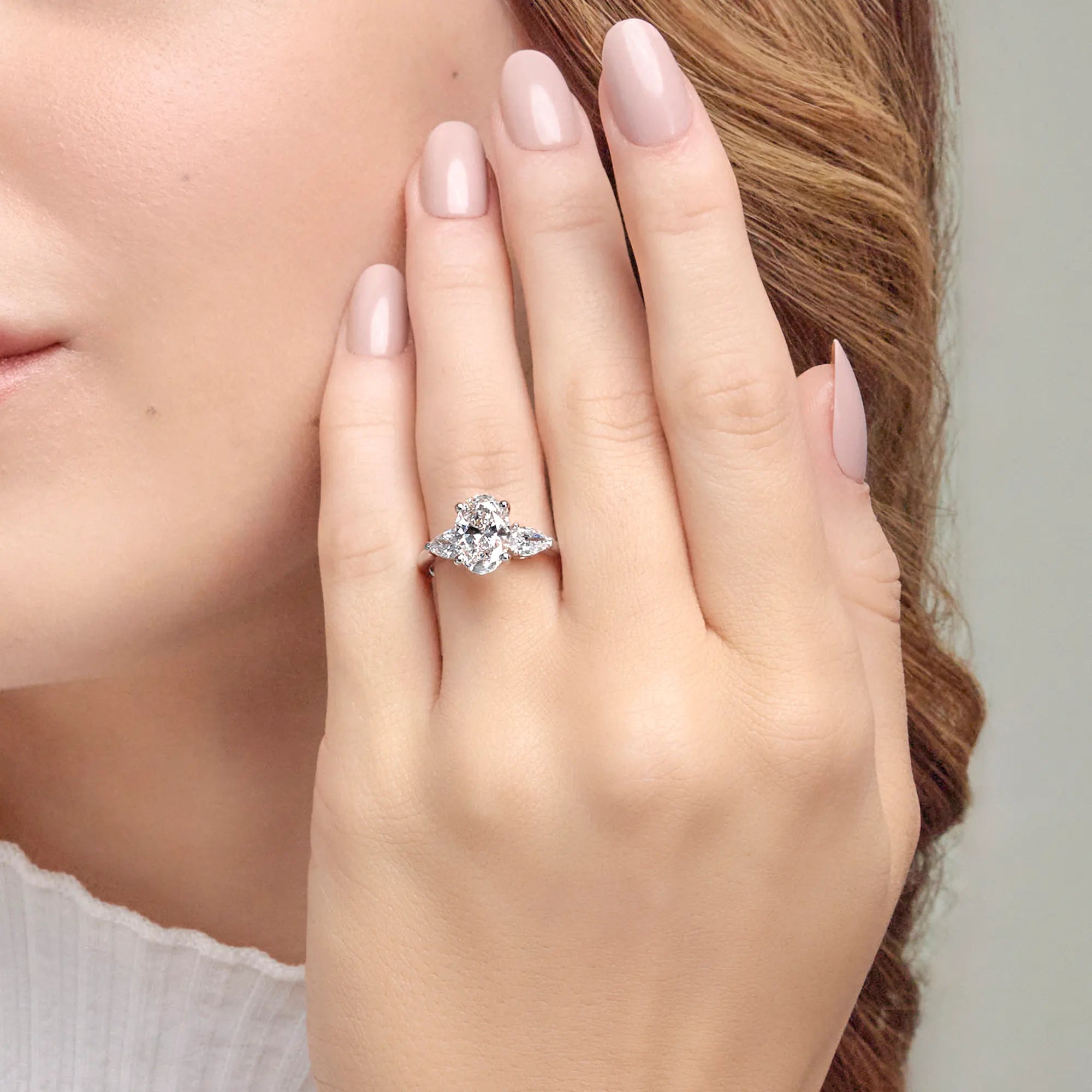 Oval Three Stone Lab-Grown Diamond Engagement Ring with Pear Side Stones