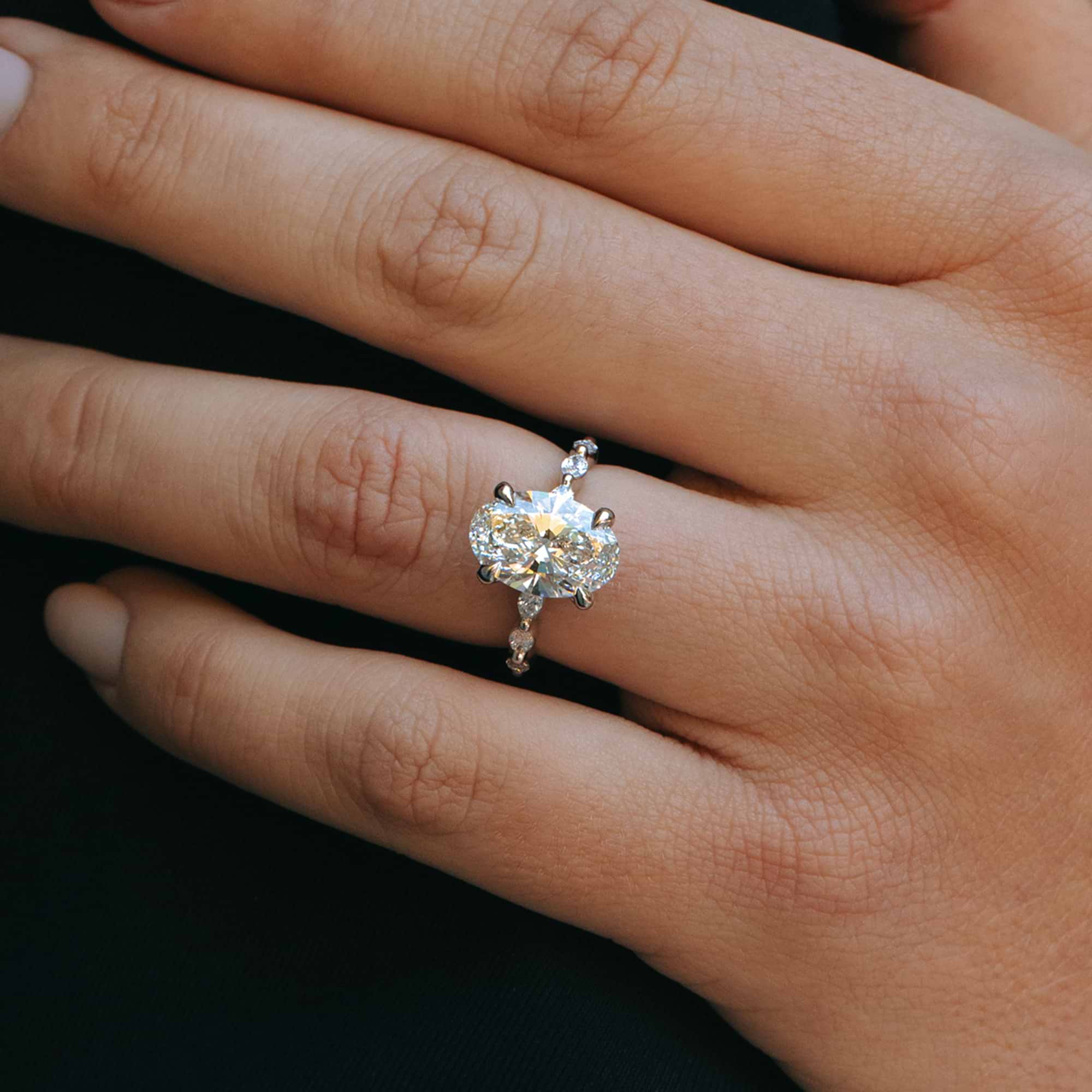 Round Lab Grown Diamond Engagement Ring with Marquise Side Accents