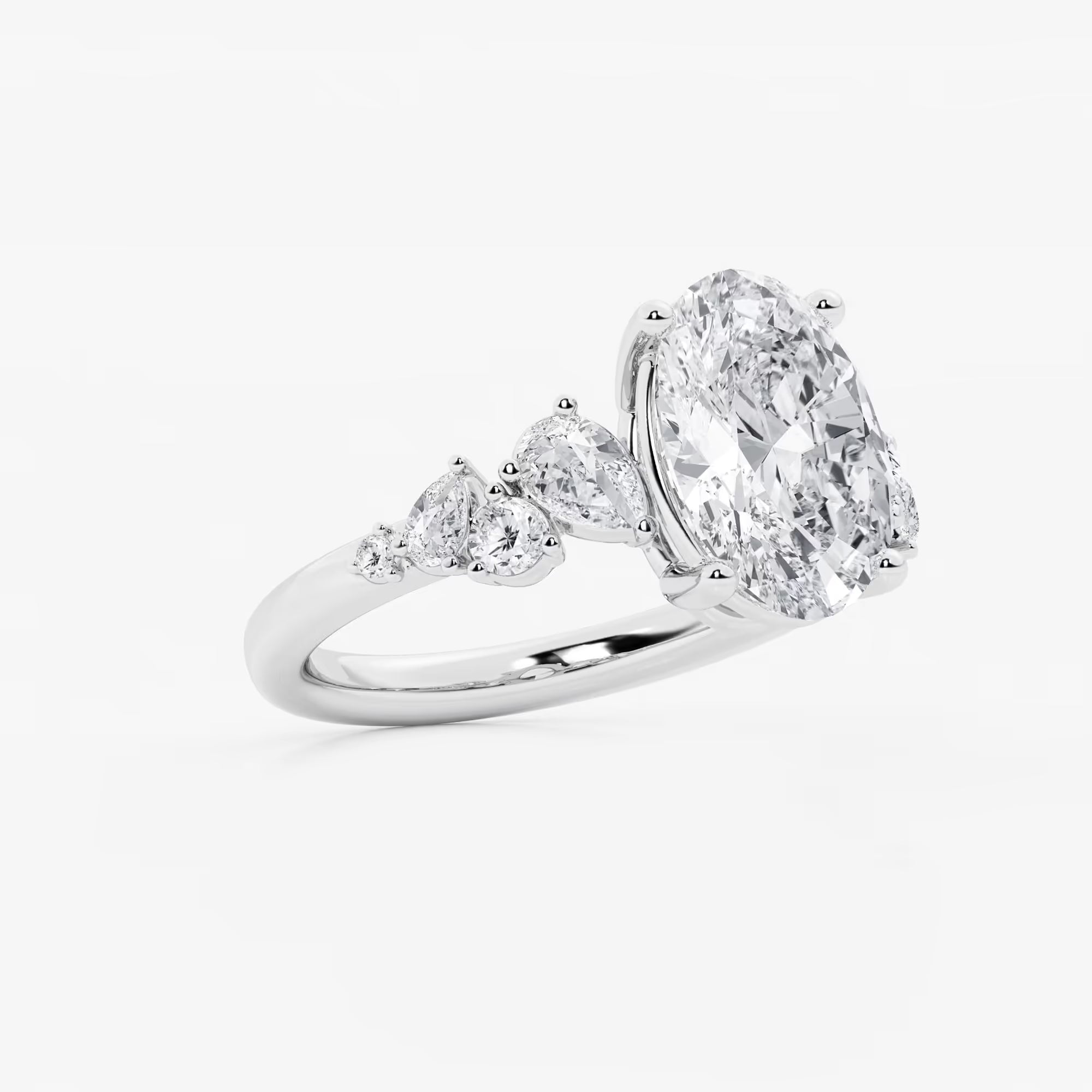 Serenelle Oval Lab Grown Diamond Pear & Round Side Stone Engagement Ring