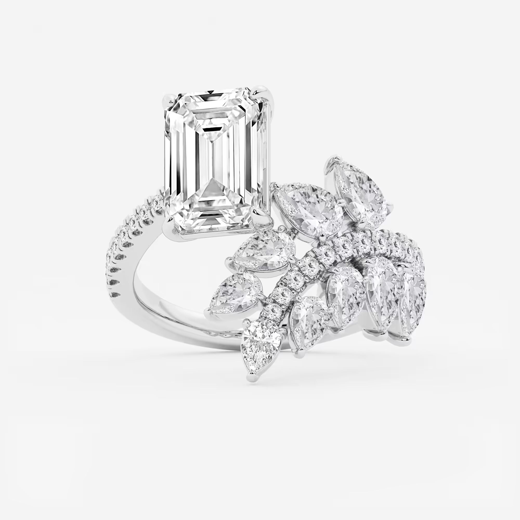Here's the title and description:  Emerald Cut Toi et Moi Engagement Ring  Floral Marquise & Pear Diamond Bouquet Design
