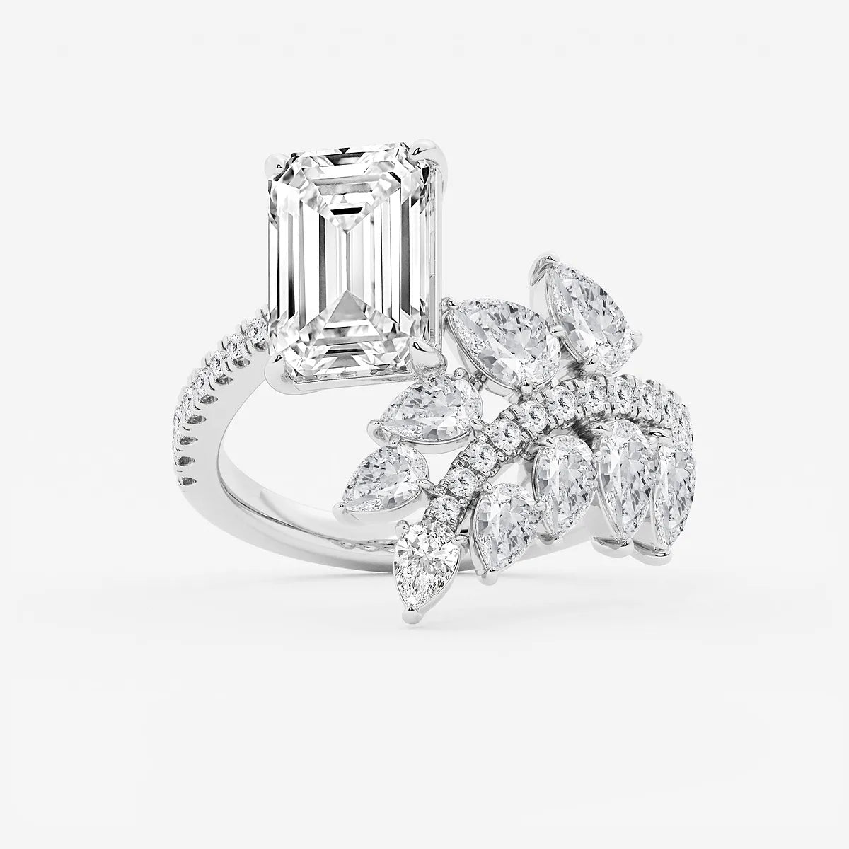 Here's the title and description:  Emerald Cut Toi et Moi Engagement Ring  Floral Marquise & Pear Diamond Bouquet Design