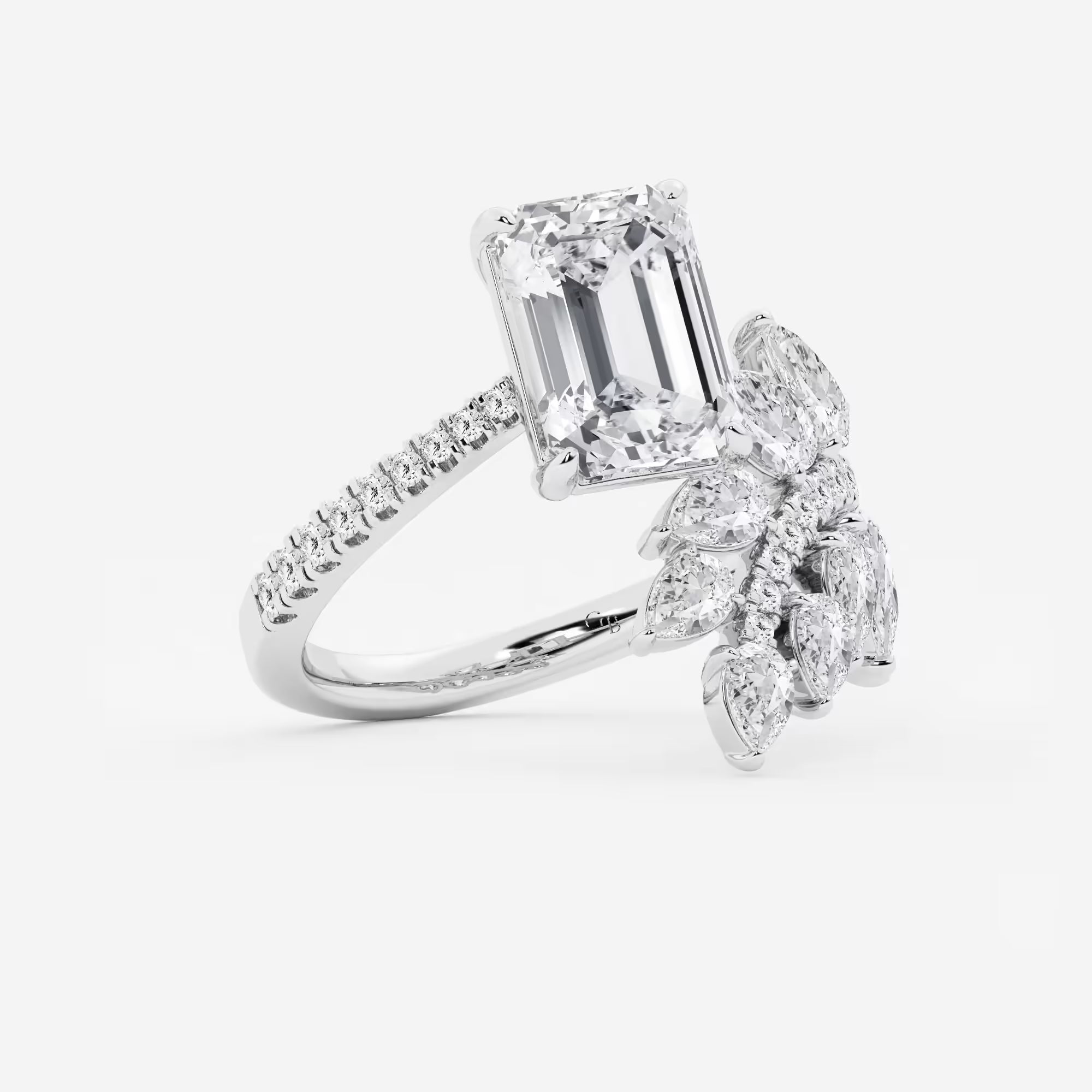 Here's the title and description:  Emerald Cut Toi et Moi Engagement Ring  Floral Marquise & Pear Diamond Bouquet Design