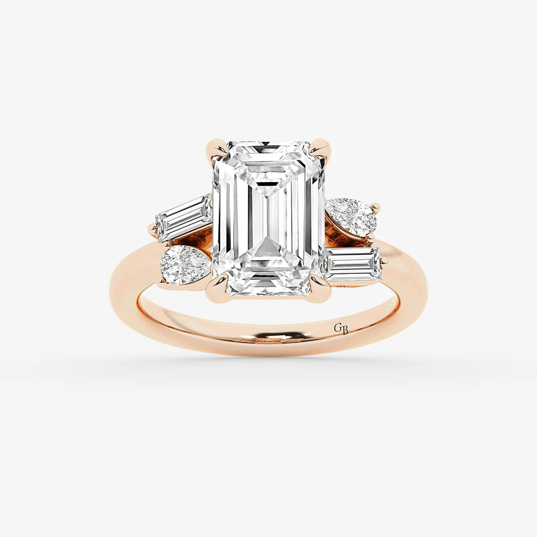 Emerald Cut Ring with Asymmetric Baguette & Pear Diamond Cluster Shoulders