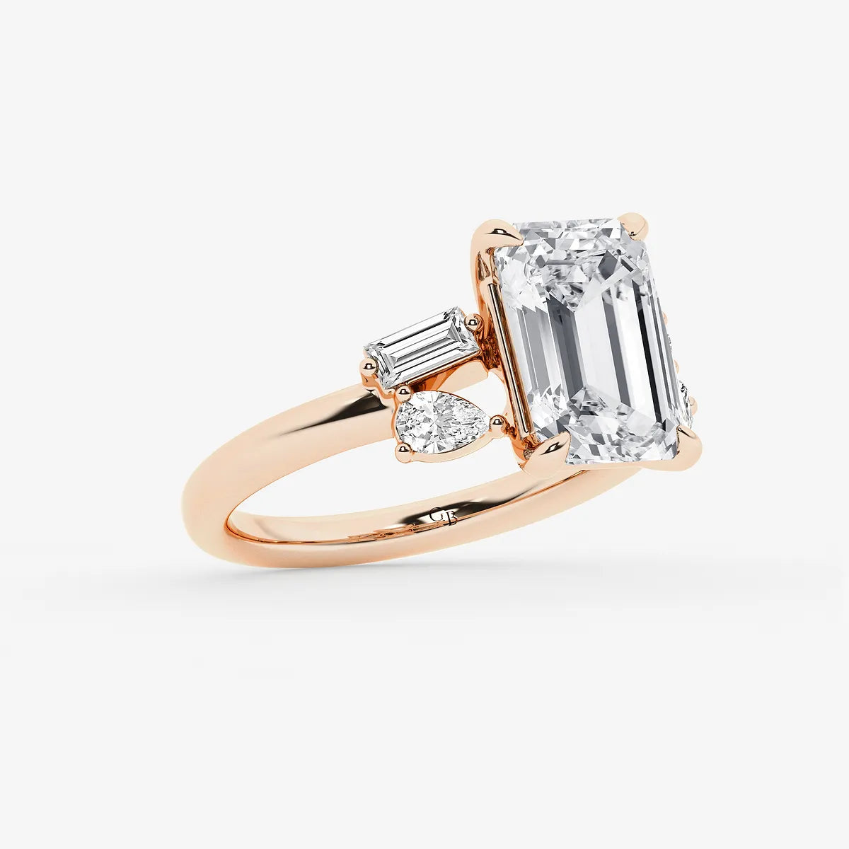 Emerald Cut Ring with Asymmetric Baguette & Pear Diamond Cluster Shoulders