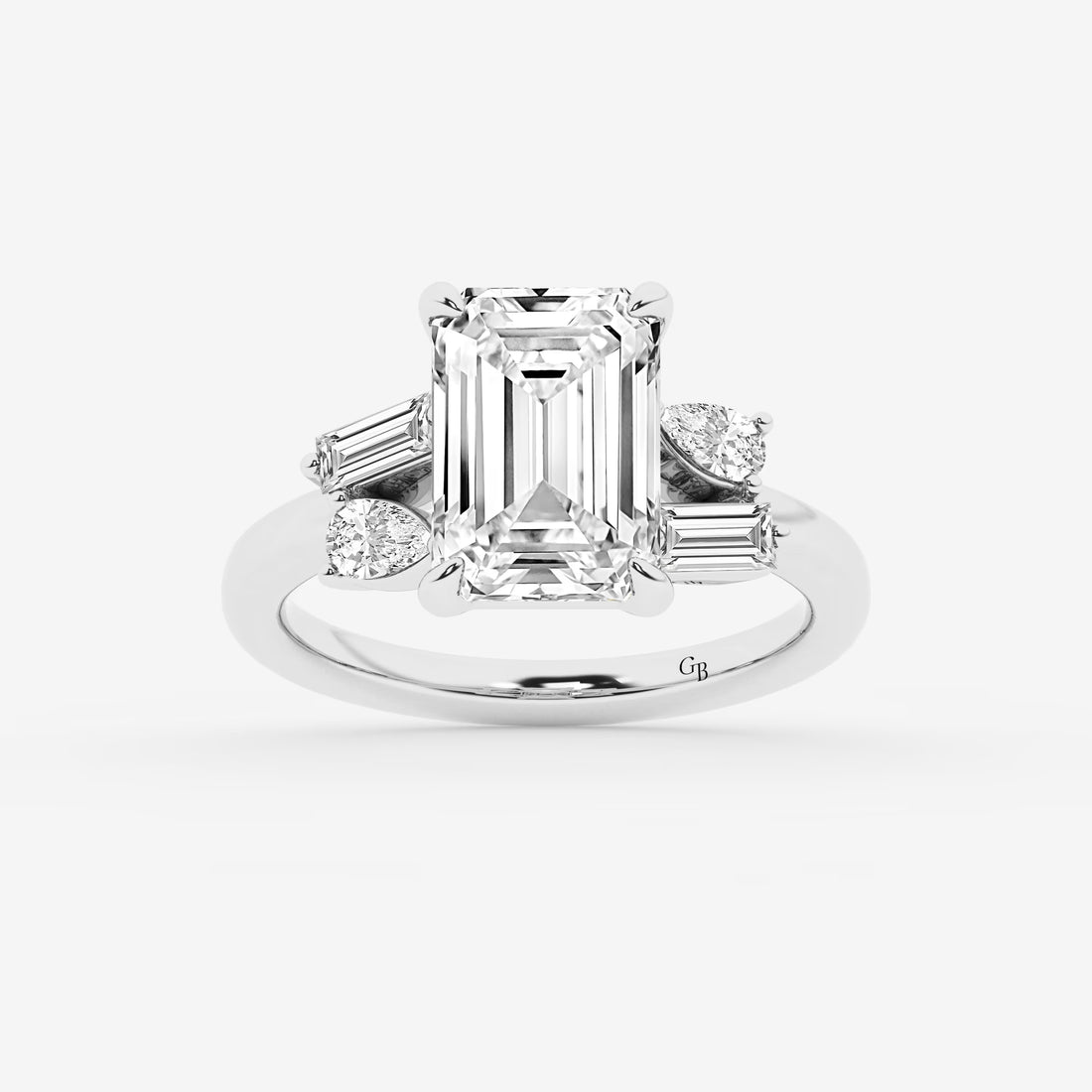 Emerald Cut Ring with Asymmetric Baguette & Pear Diamond Cluster Shoulders