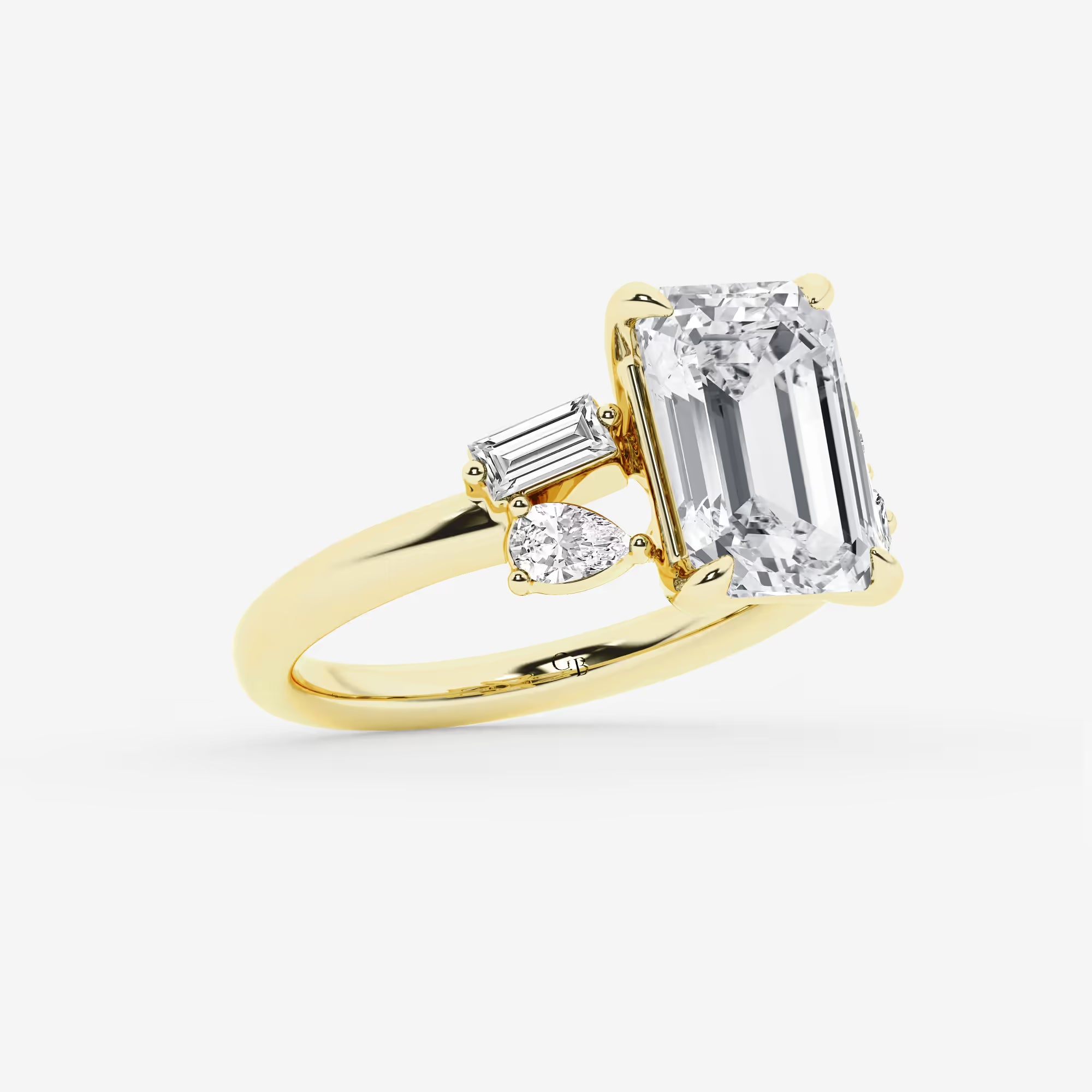 Emerald Cut Ring with Asymmetric Baguette & Pear Diamond Cluster Shoulders