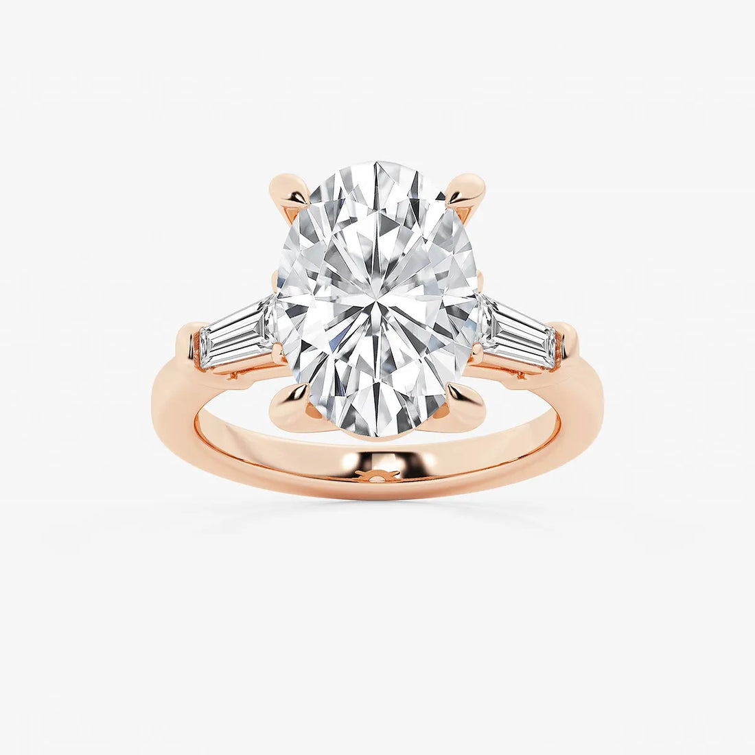 Oval Cut Diamond Engagement Ring with Tapered Baguette Side Stones in White Gold