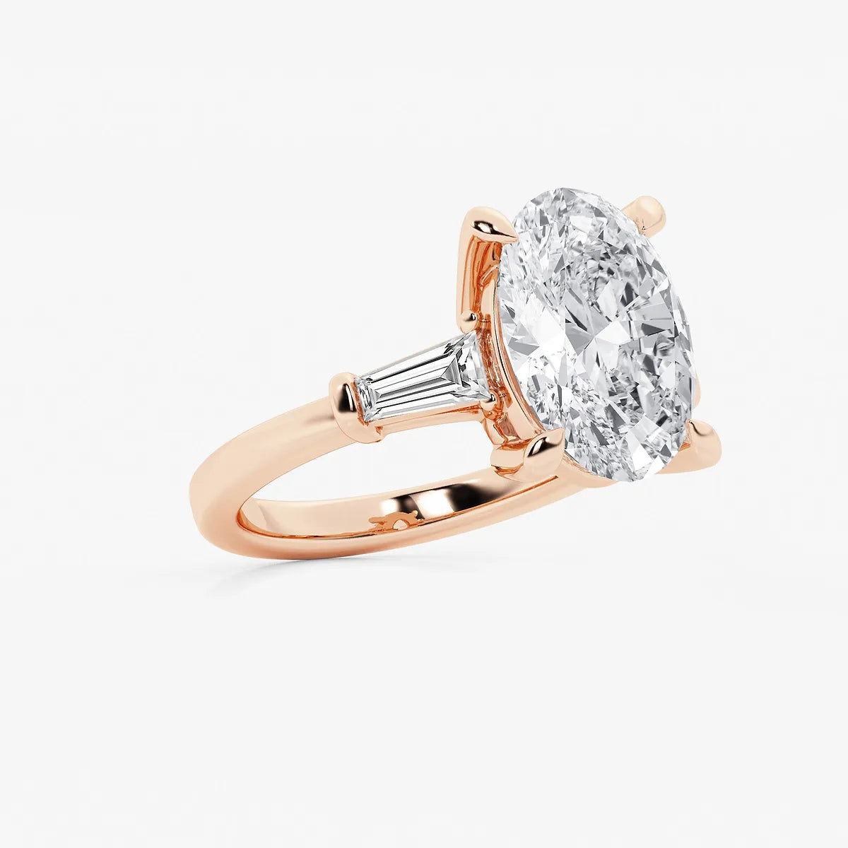Oval Cut Diamond Engagement Ring with Tapered Baguette Side Stones in White Gold