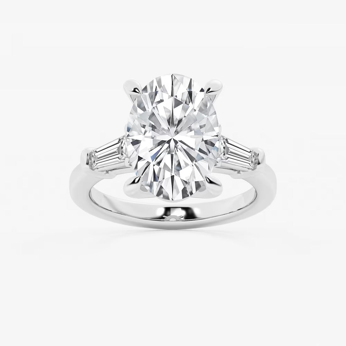 Oval Cut Diamond Engagement Ring with Tapered Baguette Side Stones in White Gold