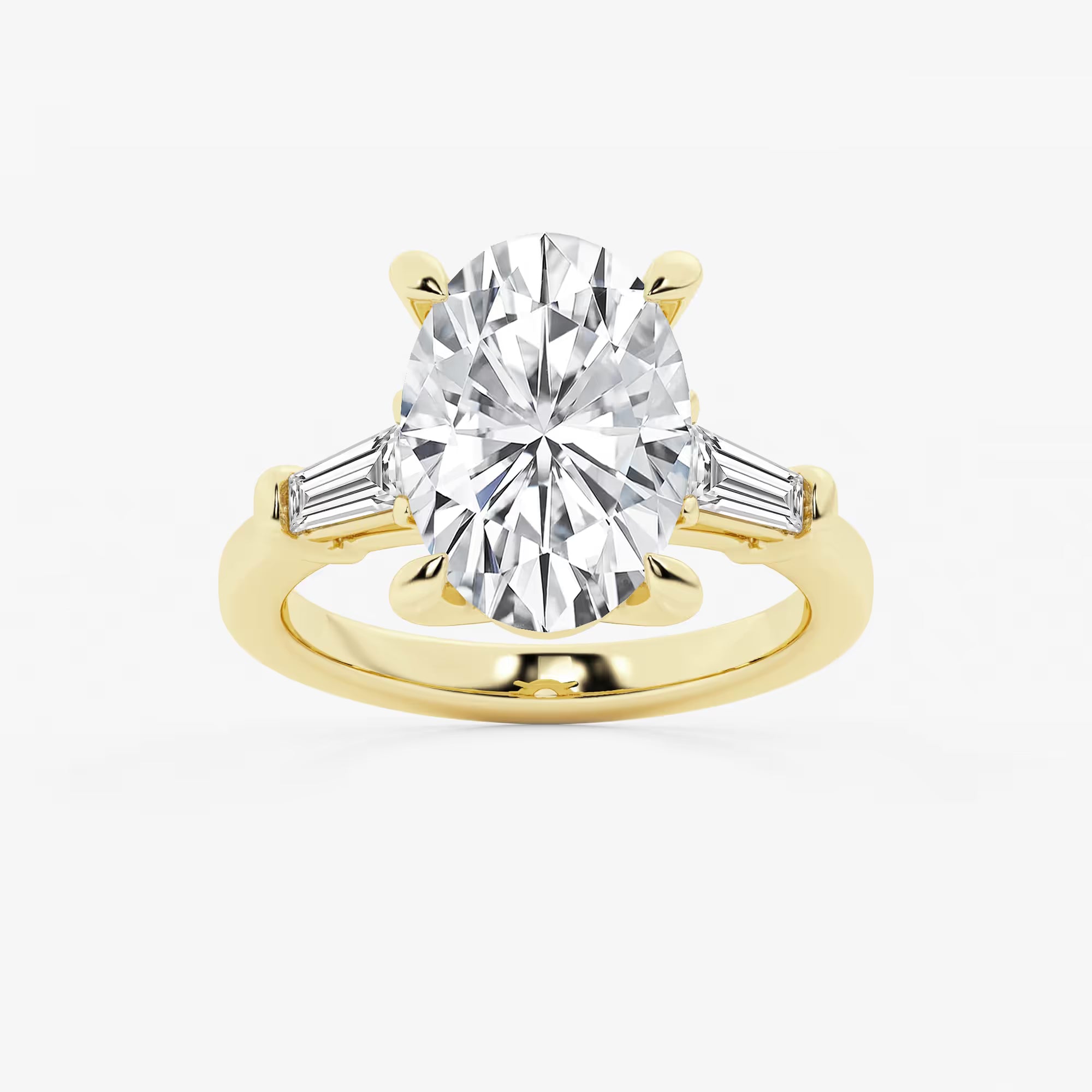 Oval Cut Diamond Engagement Ring with Tapered Baguette Side Stones in White Gold