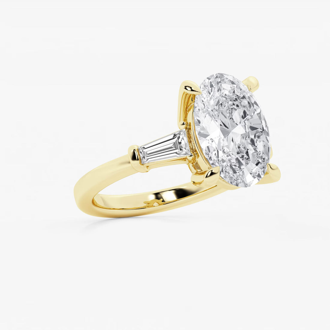 Oval Cut Diamond Engagement Ring with Tapered Baguette Side Stones in White Gold