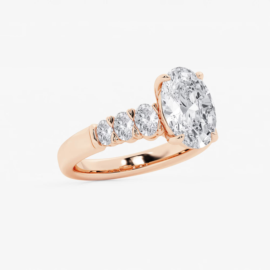 Luminara Graduated Elegance Oval Lab Grown Diamond Engagement Ring