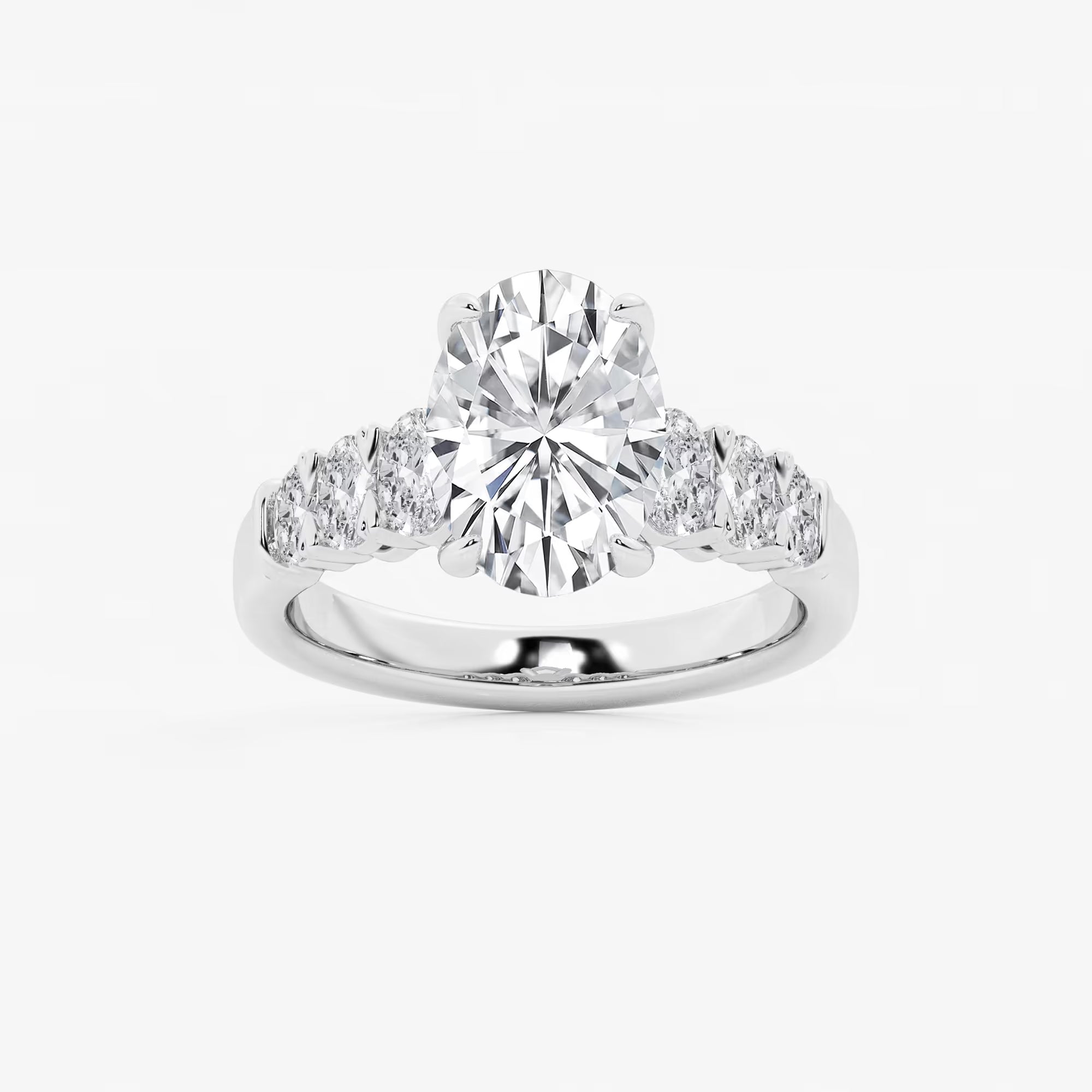 Luminara Graduated Elegance Oval Lab Grown Diamond Engagement Ring