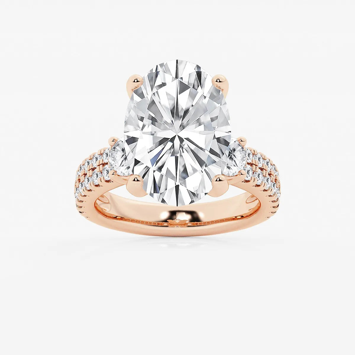 Luxurious Oval Cut Three-Stone Lab-Grown Diamond Pavé Engagement Ring