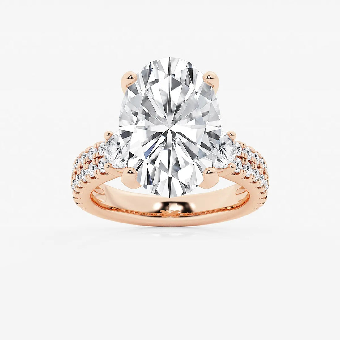 Luxurious Oval Cut Three-Stone Lab-Grown Diamond Pavé Engagement Ring