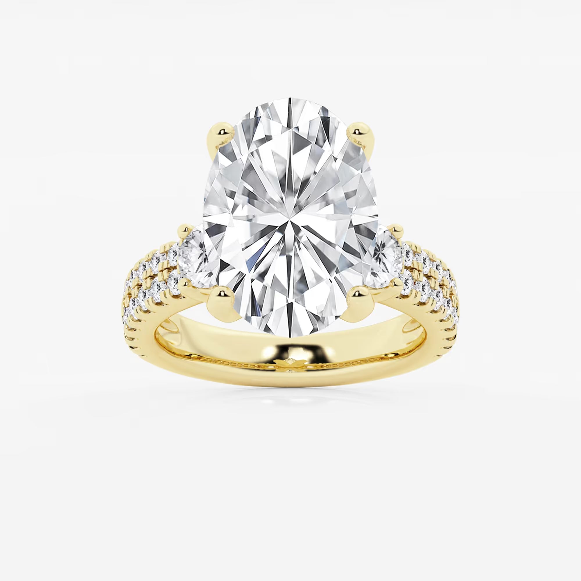 Luxurious Oval Cut Three-Stone Lab-Grown Diamond Pavé Engagement Ring