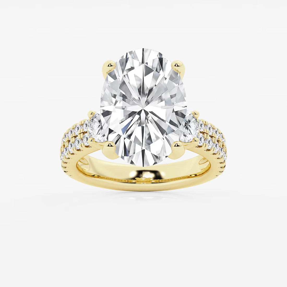 Luxurious Oval Cut Three-Stone Lab-Grown Diamond Pavé Engagement Ring
