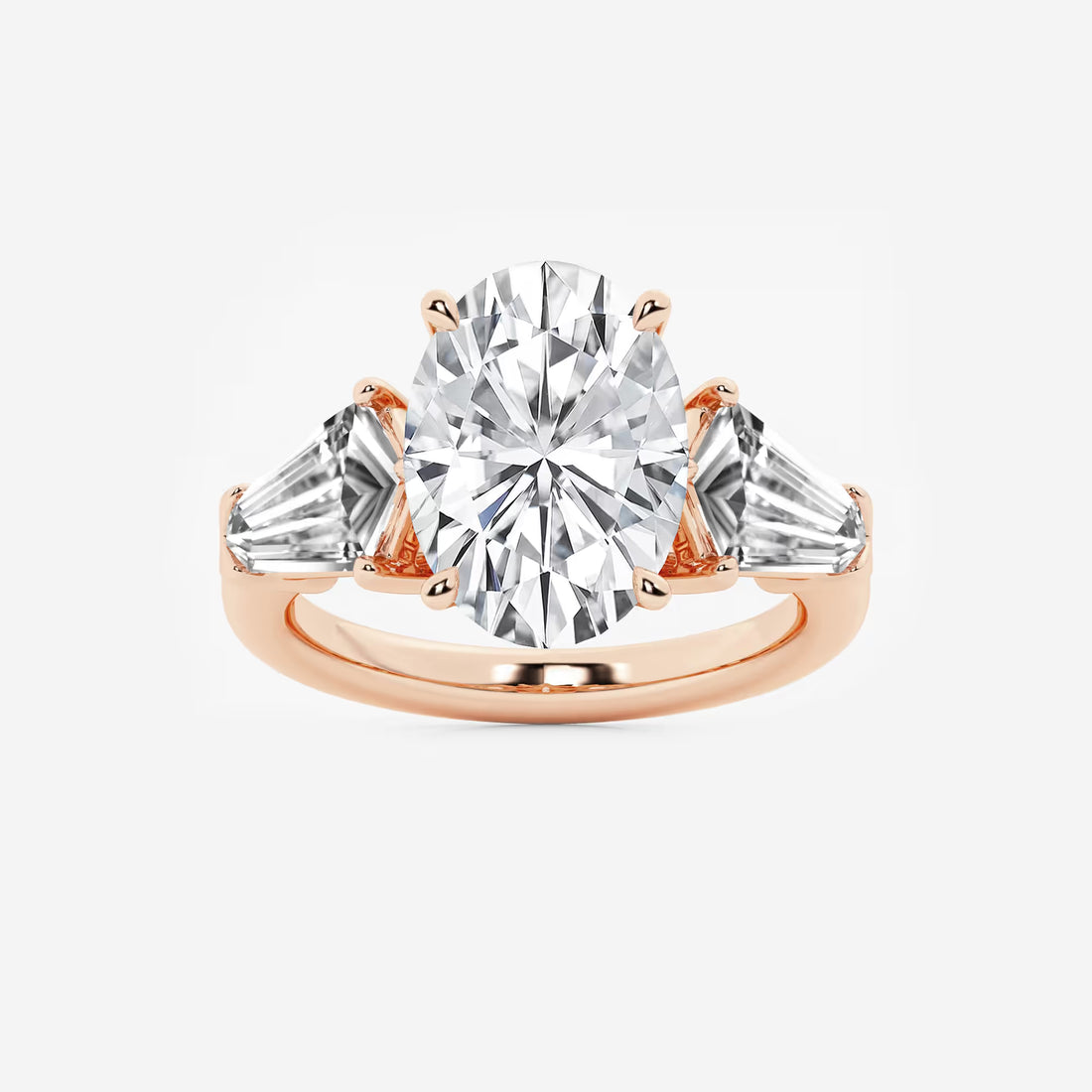 Title: Oval Cut Three-Stone Engagement Ring