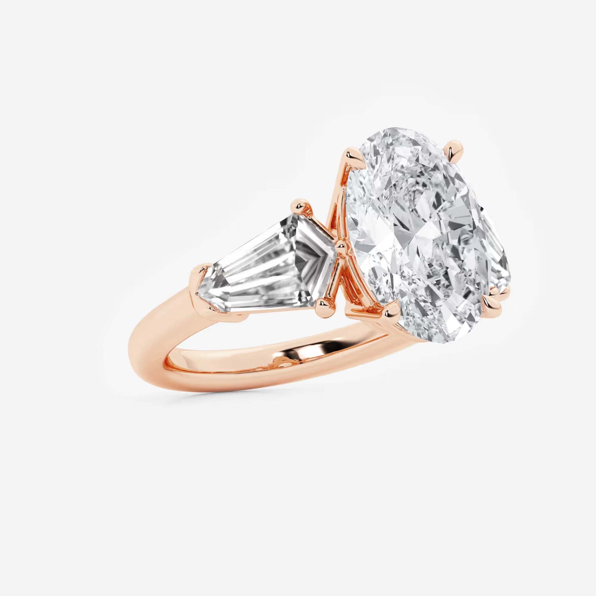 Title: Oval Cut Three-Stone Engagement Ring