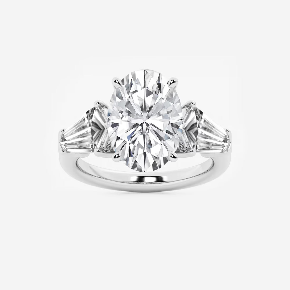 Title: Oval Cut Three-Stone Engagement Ring