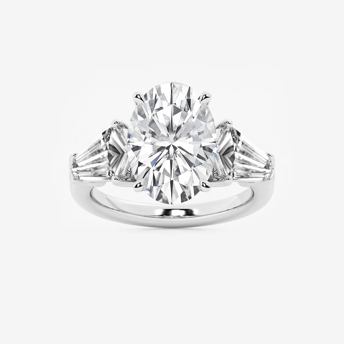 Title: Oval Cut Three-Stone Engagement Ring