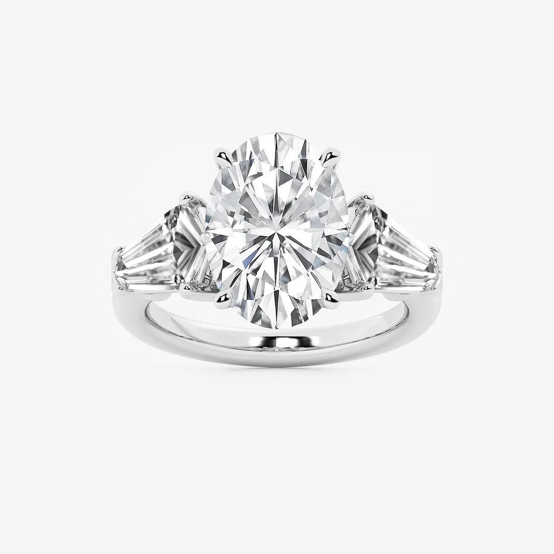 Title: Oval Cut Three-Stone Engagement Ring