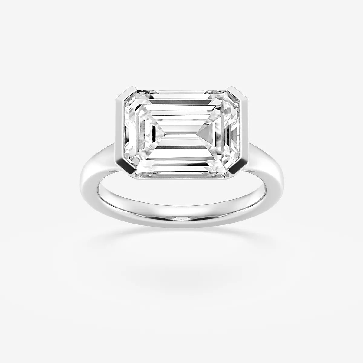 Emerald Cut East-West Bezel Solitaire Engagement Ring