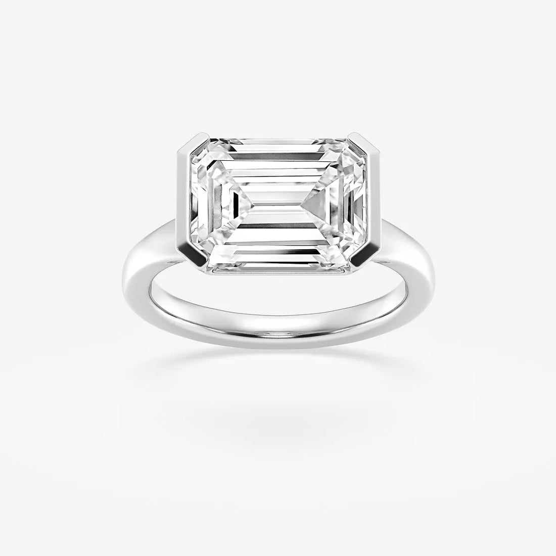 Emerald Cut East-West Bezel Solitaire Engagement Ring