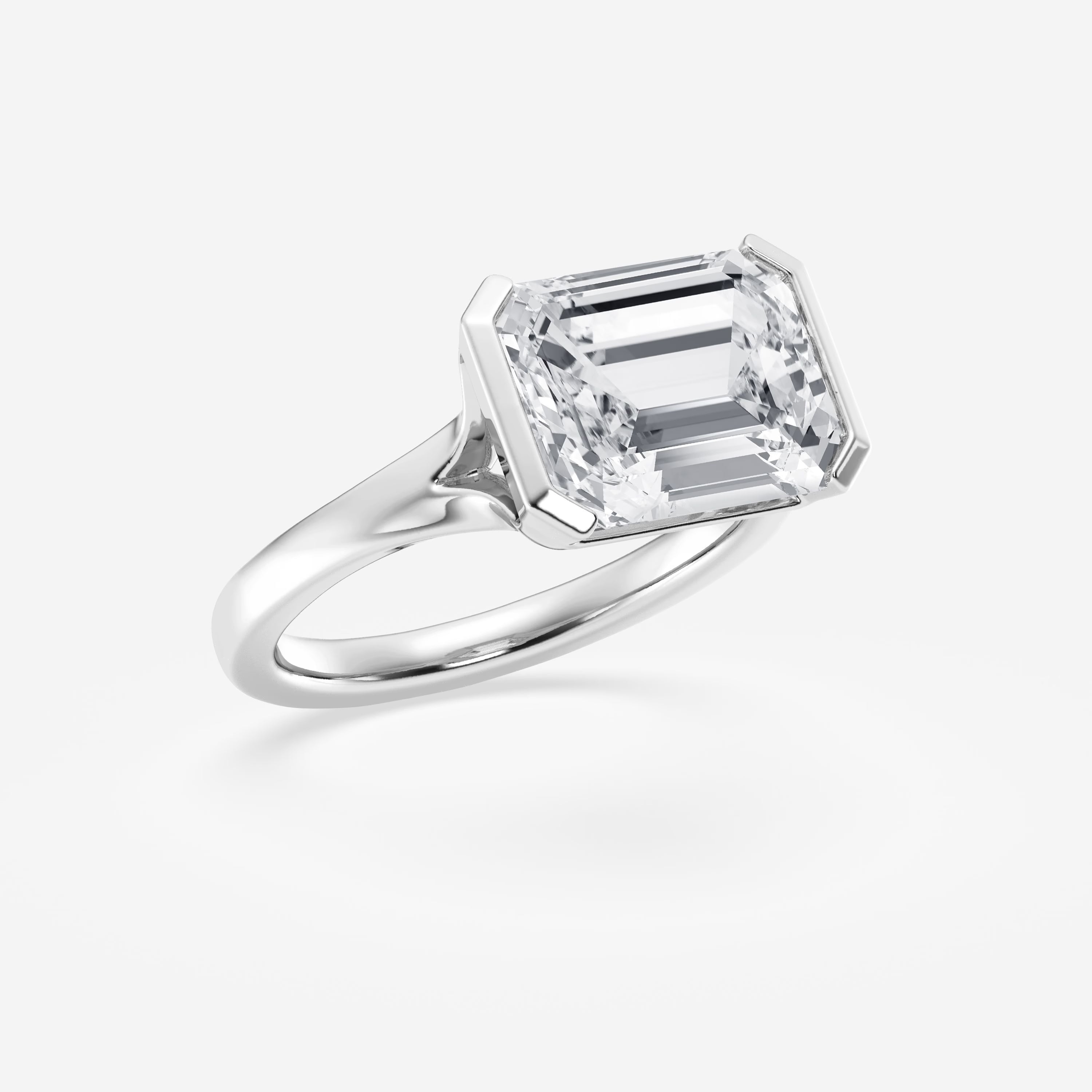 Emerald Cut East-West Bezel Solitaire Engagement Ring