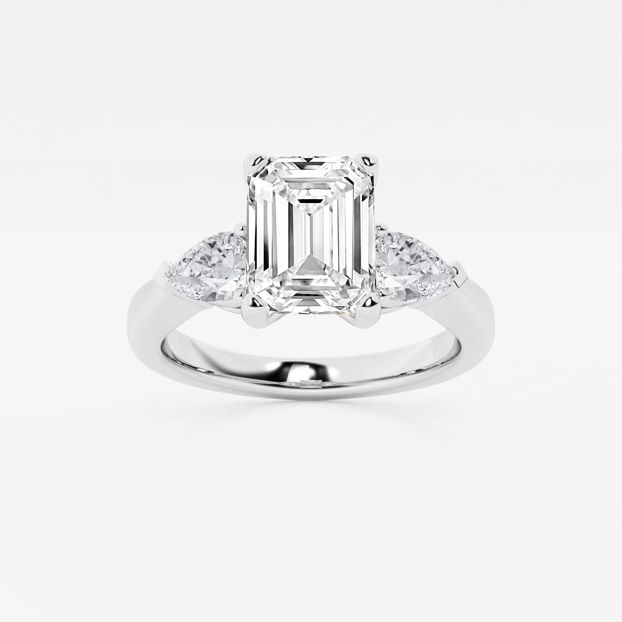 Emerald Cut Three-Stone Engagement Ring