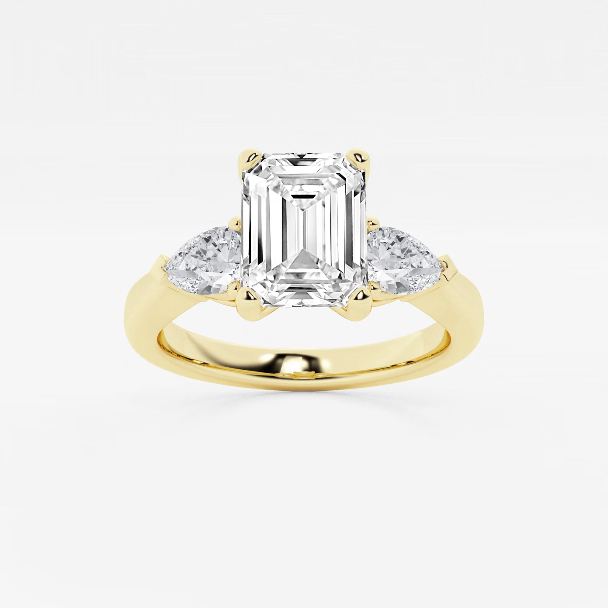 Emerald Cut Three-Stone Engagement Ring