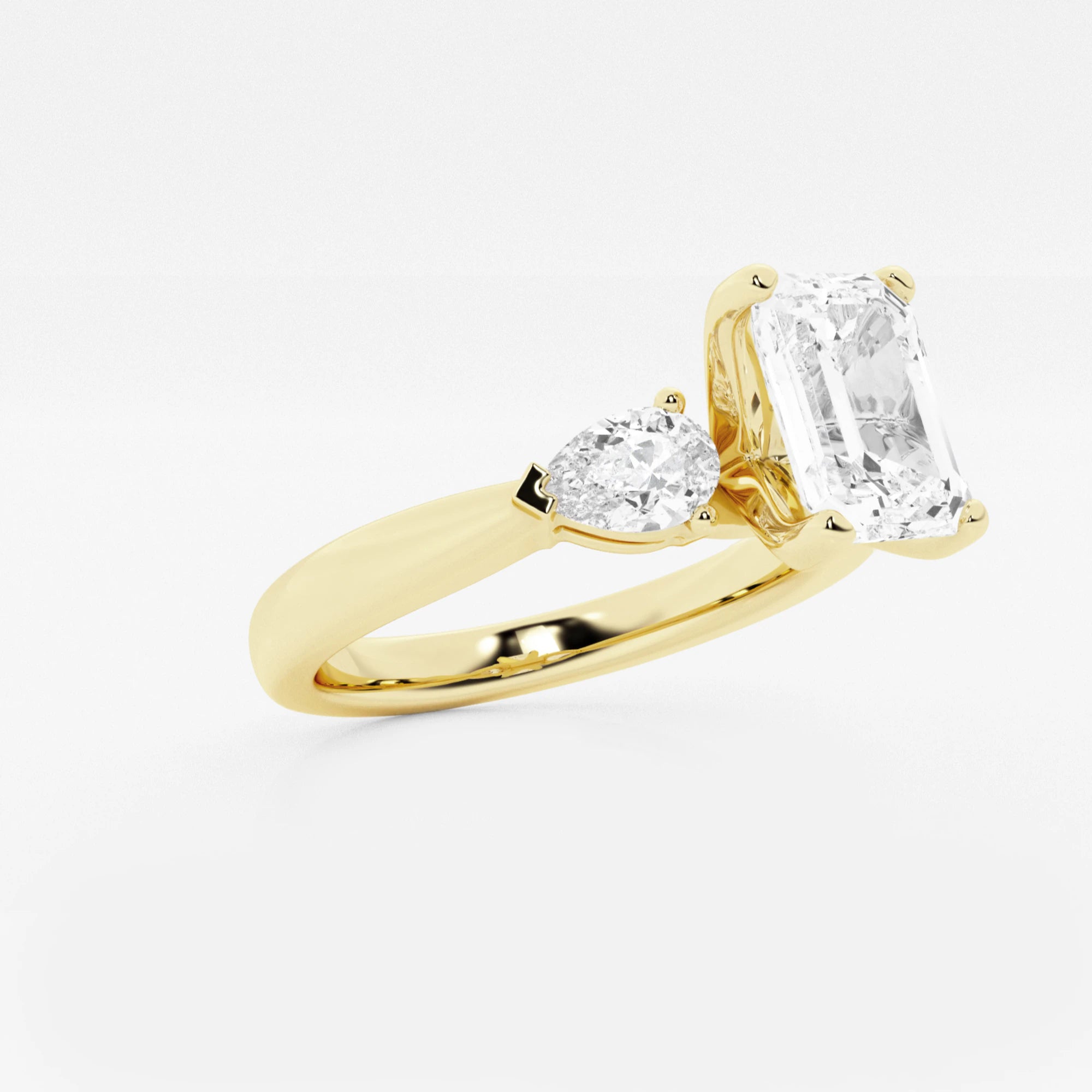Emerald Cut Three-Stone Engagement Ring
